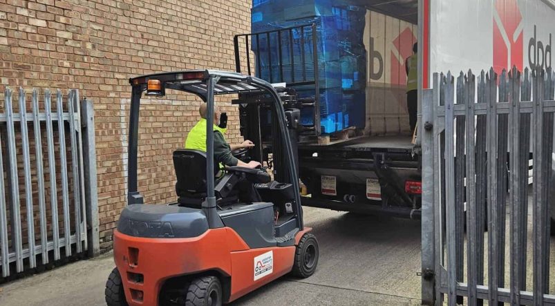 Forklift loading cargo at the Ducting Express Warehouse