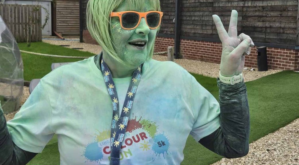 Tracy from Ducting Express covered in green paint